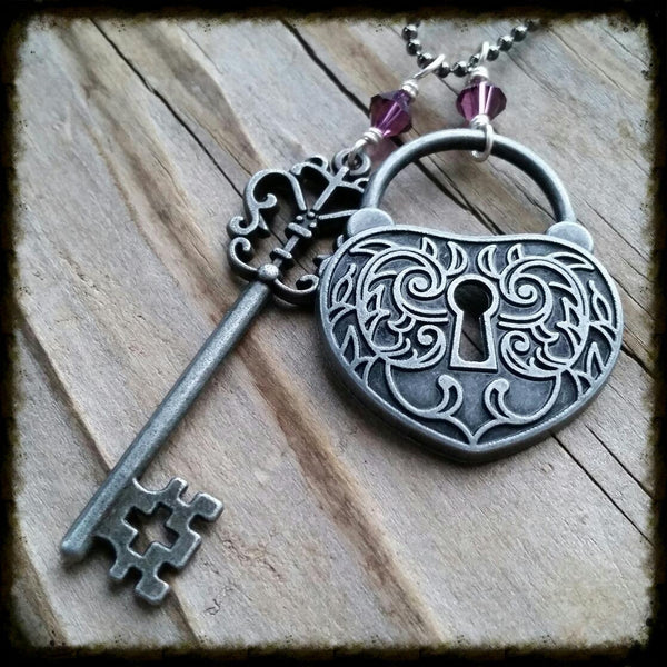 Essential oil diffuser necklace-cluster-skeleton key-heart- lock- Swarovski Crystal- antiqued silver