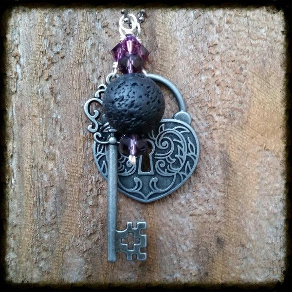 Essential oil diffuser necklace-cluster-skeleton key-heart- lock- Swarovski Crystal- antiqued silver