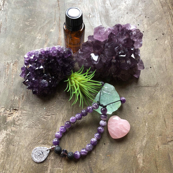 Hand stamped essential oil diffuser bracelet- amethyst with drop charm