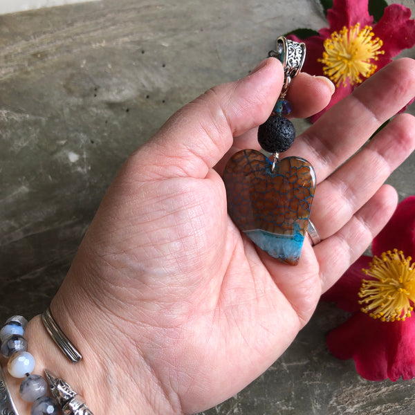 Essential oil diffuser necklace - brown/turquoise crazy lace agate asymmetrical heart