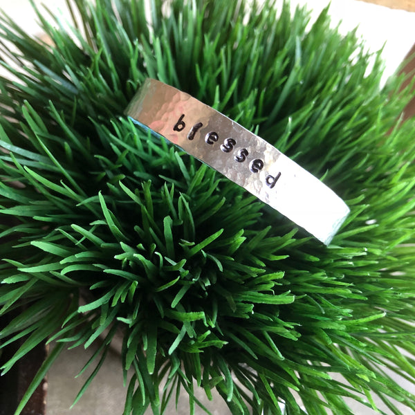 Hand stamped aluminum bracelet - blessed