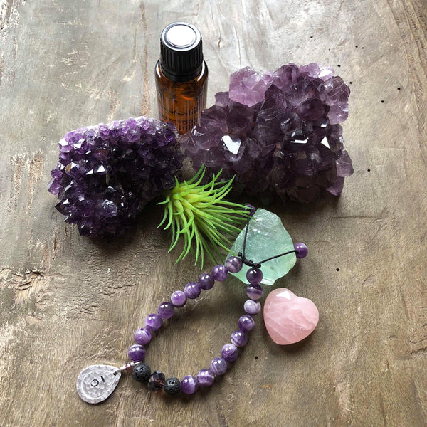Hand stamped essential oil diffuser bracelet- amethyst with drop charm