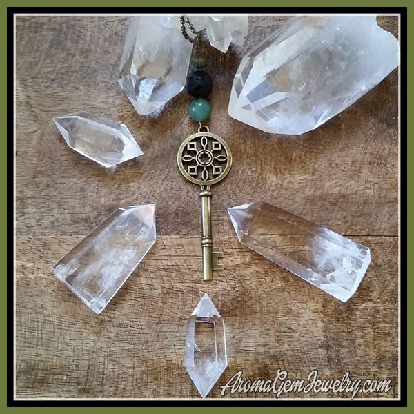 Essential oil diffuser necklace - skeleton key - sunburst