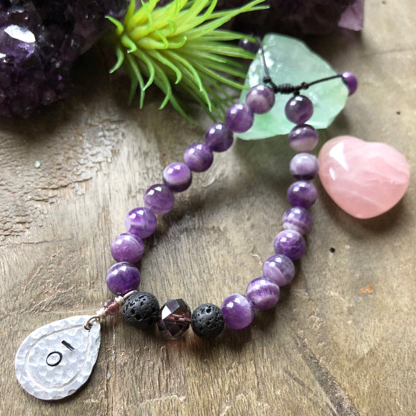 Hand stamped essential oil diffuser bracelet- amethyst with drop charm