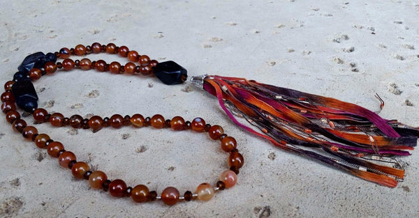 Essential oil diffuser necklace - Red Agate, Blackstone - tassel