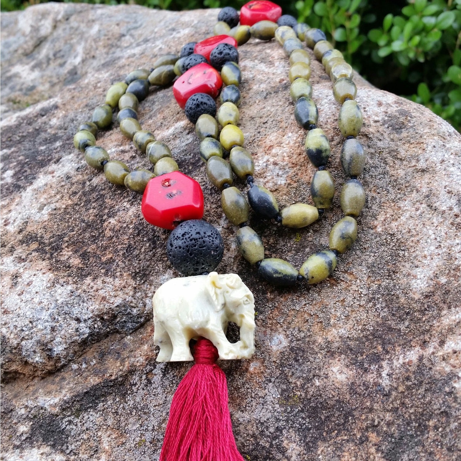 Essential oil diffuser necklace - knotted yellow turquoise, red coral - mala - elephant amulet and tassle