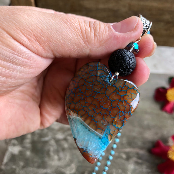 Essential oil diffuser necklace - brown/turquoise crazy lace agate asymmetrical heart