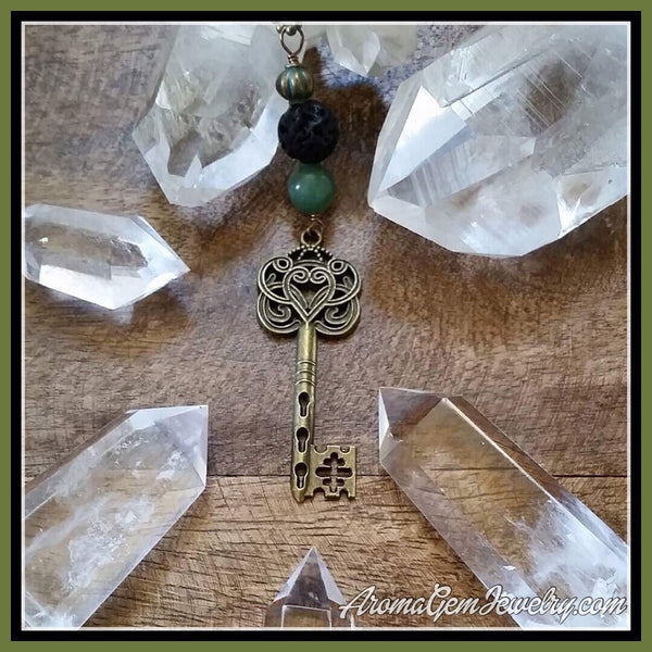 Essential oil diffuser necklace- skeleton key -scroll