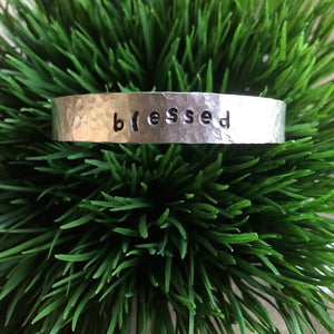 Hand stamped aluminum bracelet - blessed