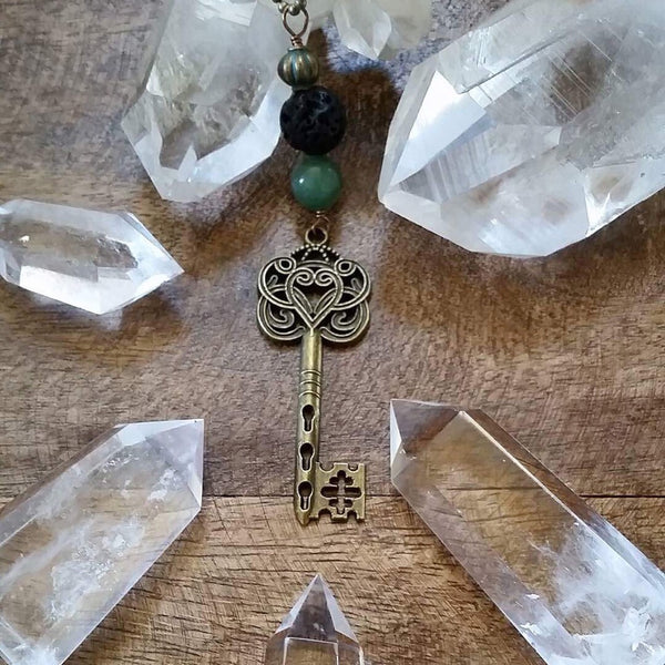 Essential oil diffuser necklace- skeleton key -scroll